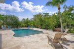 Tropical landscaping beside this amazing private pool with pool heat option